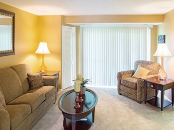 Security Park Apartments living room with balcony